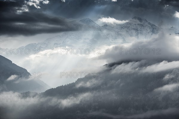 Thunderstorm clounds over Eiger mountain and Monch mountain