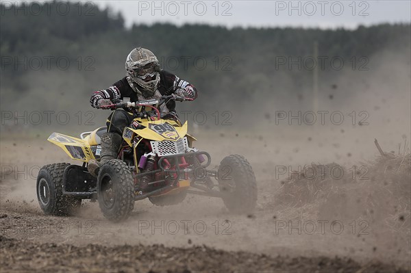 Quad rider on a field