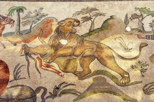 Ancient Roman mosaic of a lion being hunted