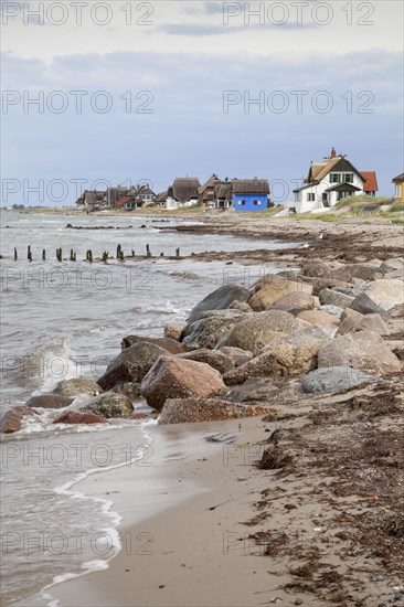 Cottages with thatched roofs on the coast