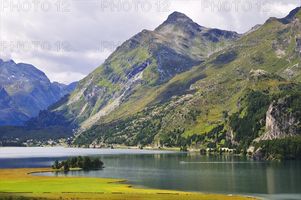 View over the alluvial land of the river Aua da Fedoz towards Plaun da Lej