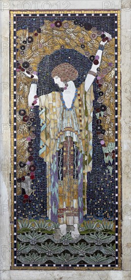 Woman holding a garland of corn