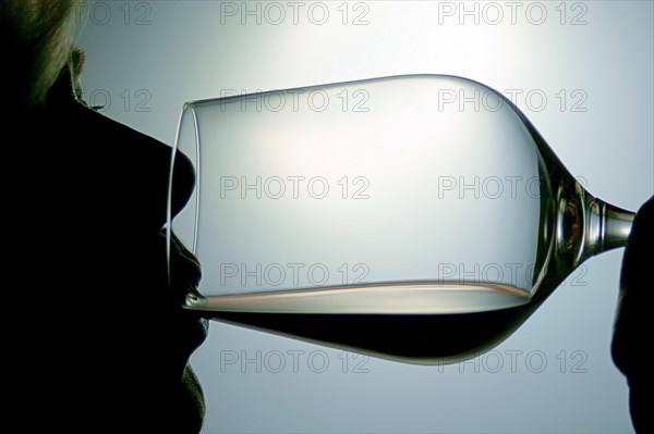 Woman drinking red wine