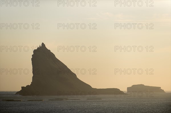 Steep towering rocks off Vagar