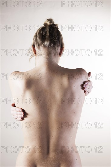 Bare back of a young woman