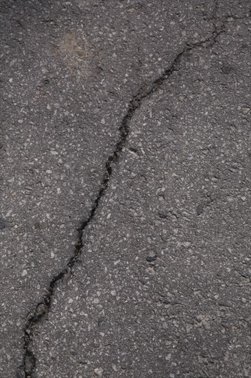 Cracked asphalt pavement