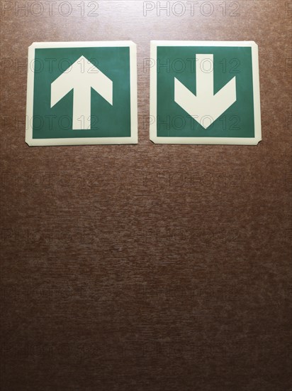 Two arrows pointing up and down