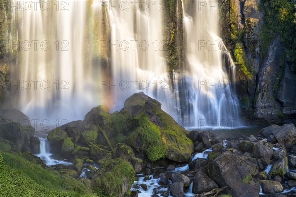 Marokopa Falls in the evening light with a rainbow
