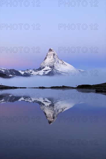 Matterhorn reflected in Lake Stellisee at dusk