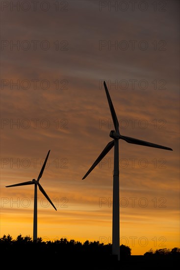 Wind turbines at sunset