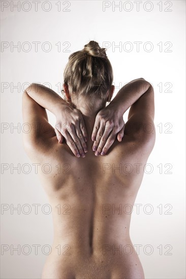Bare back of a young woman