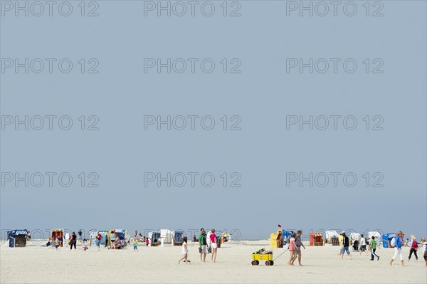 Colourful roofed wicker beach chairs on the beach