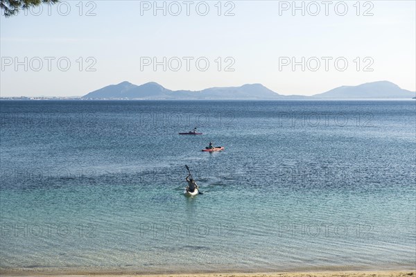 Bay and kayakers