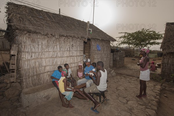 Members of the Rabelados religious community preparing a meal