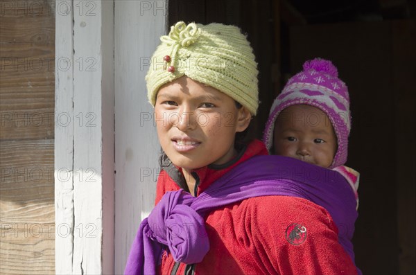 Portrait of a young local mother