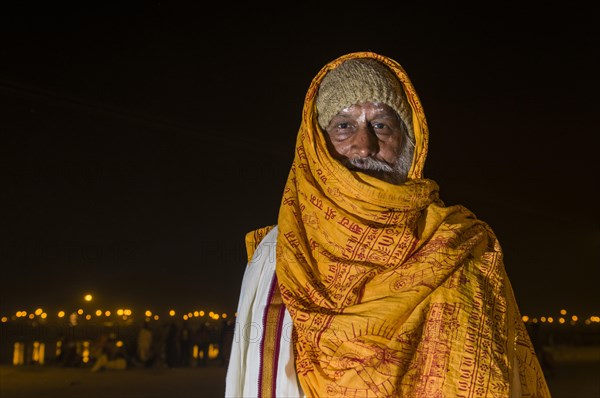 Pilgrim at night at the Sangam