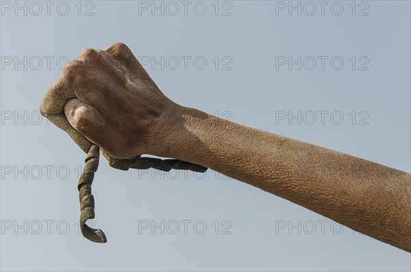 Crippled hand of a Shiva sadhu from Juna Akhara