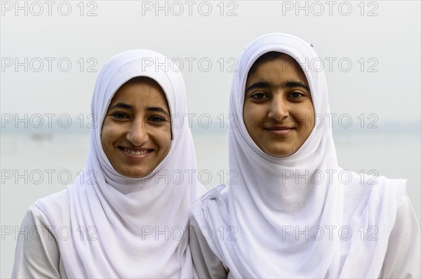 Two Kashmiri women wearing headscarves