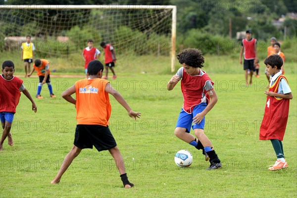 Young people playing football