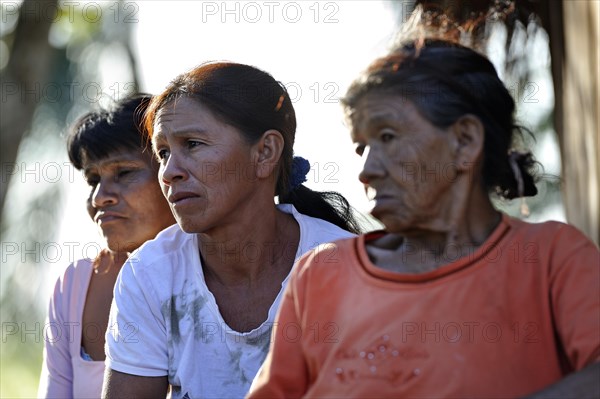 Three women with worried facial expressions