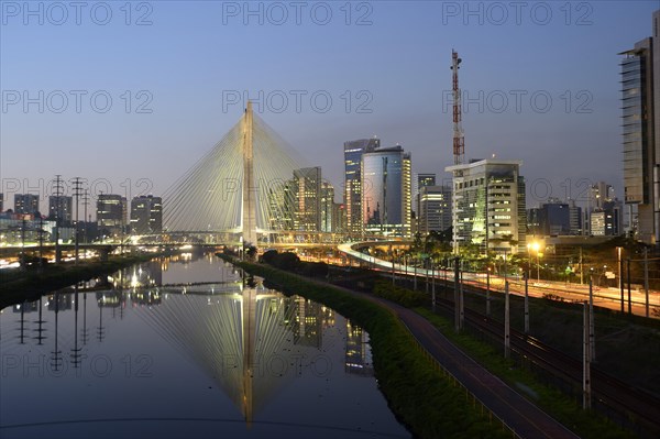 Modern skyscrapers and the Octavio Frias de Oliveira bridge over the Rio Pinheiros River