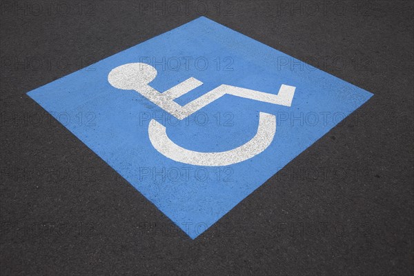 Pictogram of a parking space for disabled persons