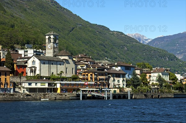 Lake view of Brissago with the Parish Church of Saints Peter and Paul on Lake Maggiore