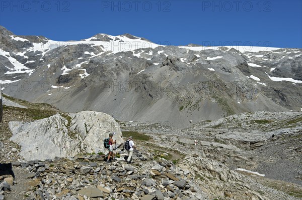 Hikers in the rocky terrain below the summit of Wildhorn Mountain