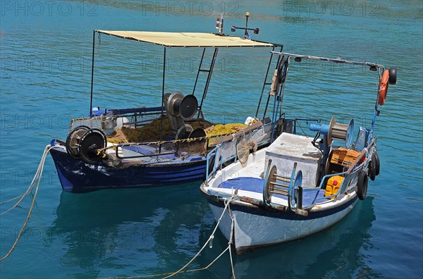 Two small fishing boats in the harbour