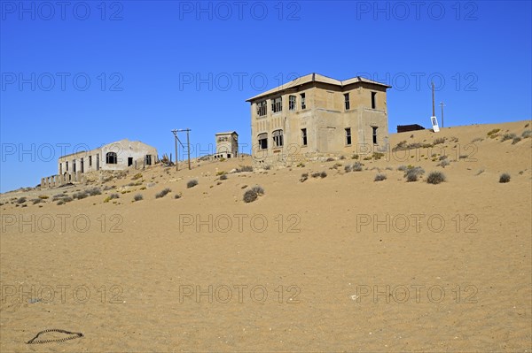 Abandoned houses in the former diamond city of Kolmanskuppe