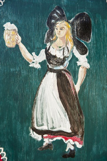 Painted window shutter with woman in traditional costume