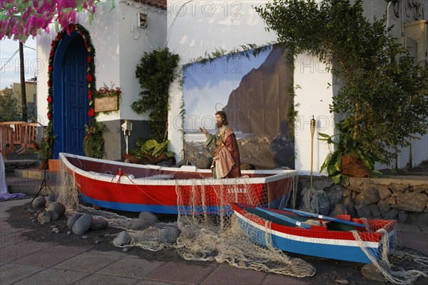 Jesus statue as a fisherman in a boat