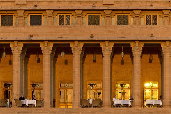 Facade of the garden side with a restaurant