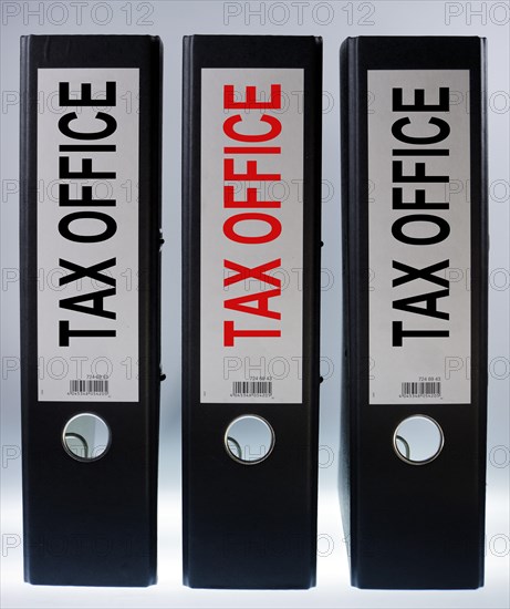 Three file folders labeled 'tax office'