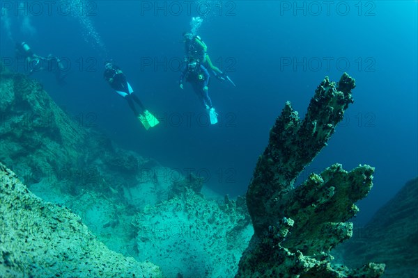 Scuba divers in Barracuda Lake