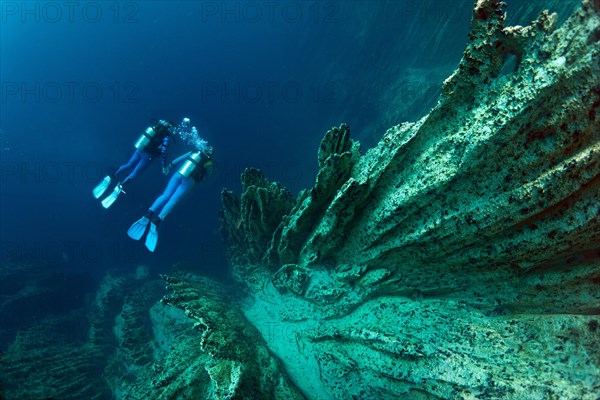 Scuba divers in Barracuda Lake