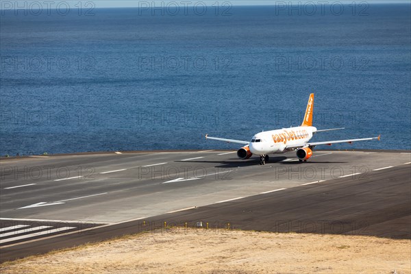 Airbus from easyjet.com preparing for takeoff at Madeira Airport
