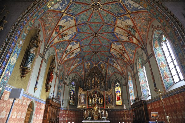 Chancel with the vaulted ceiling of the Parish Church of St. Pelagius
