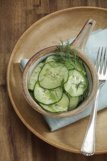Cucumber salad with vinegar-oil dressing and dill