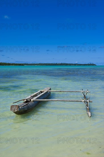 Outrigger in the turquoise waters