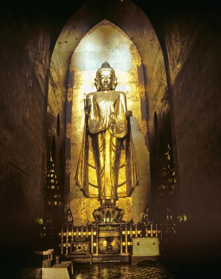 Golden standing Buddha statue in Ananda Temple