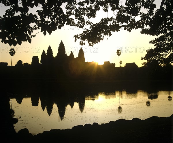 Main temple of Angkor Wat reflected in a pond