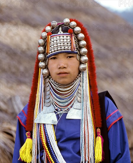 Akha girl with traditional clothing and headdress