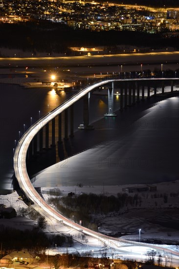 Bridge over fjord at night