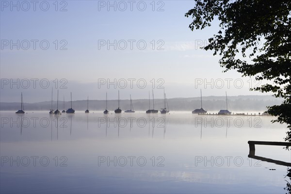 Lake Starnberg with sailing boats in the morning