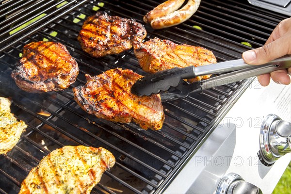 Pork steaks on a gas grill