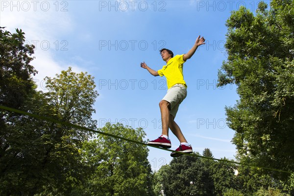 Athlete balancing on a slackline