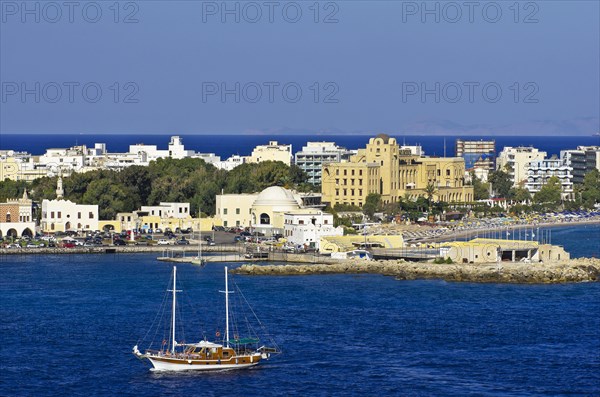 Harbour entrance of Rhodes in front of the casino and other buildings