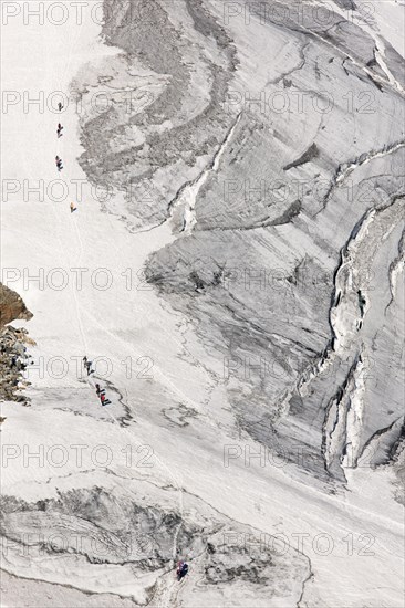 Mountain climbers during the ascent of Zuckerhuetl Mountain