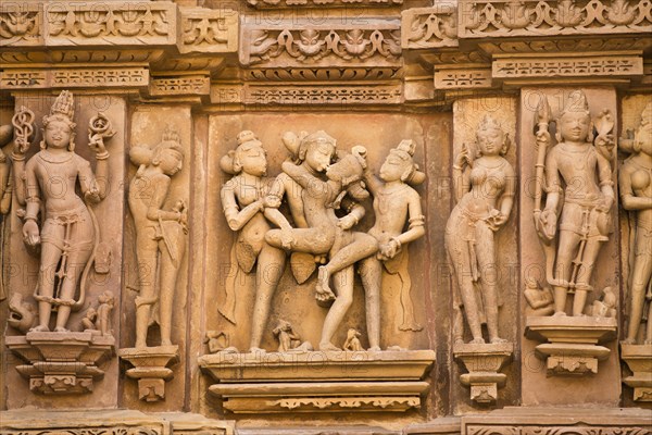 Relief sculptures of men